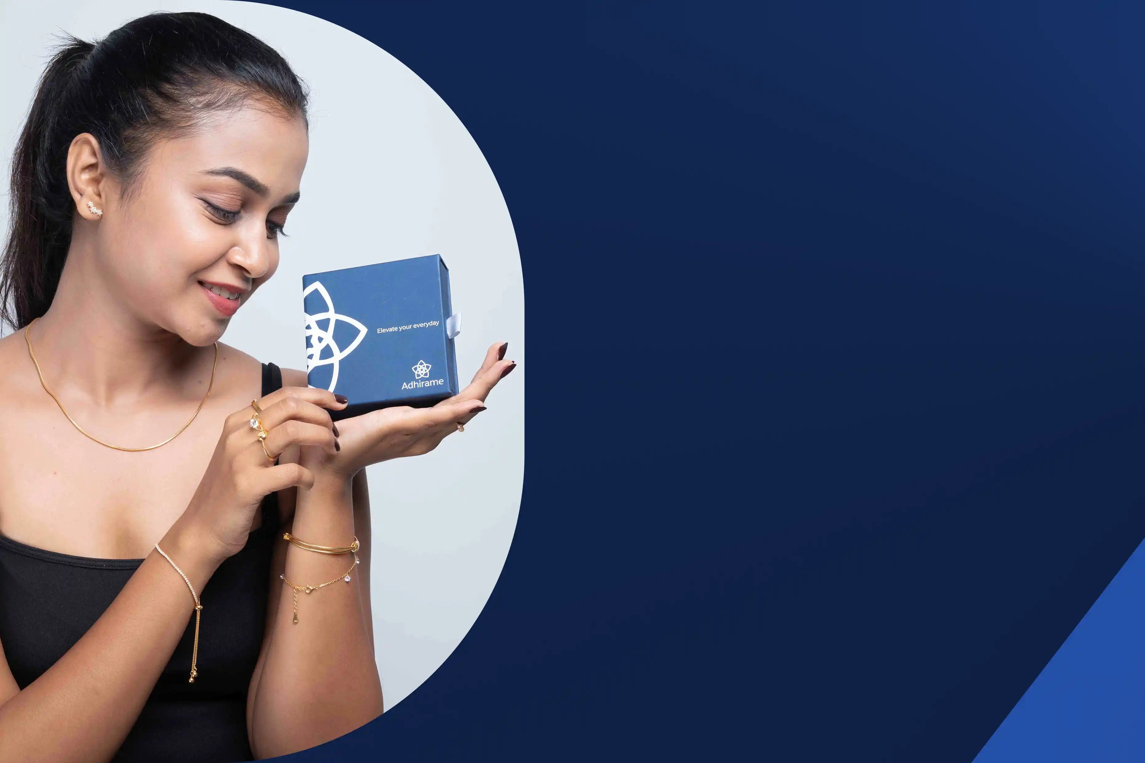 Woman holding a phone with a blue app icon on a blue background
